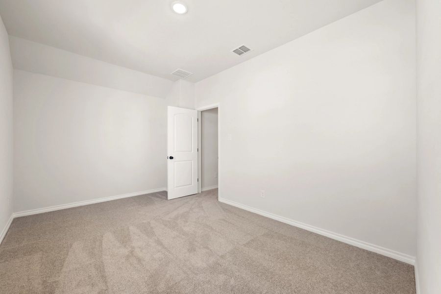 Spacious, unfurnished interior of a new home in The Homestead at Lariat, Liberty Hill (Image 54).