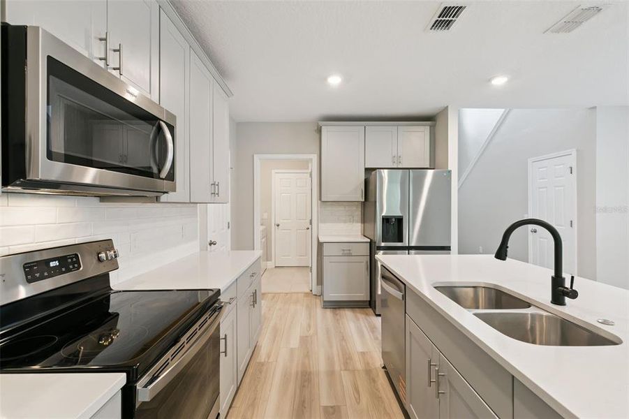 Furnished interior view inside a new home in , Daytona Beach (Image 13).