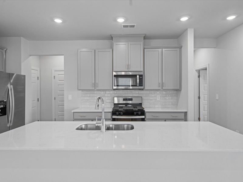 Furnished interior view inside a new home in The Farm at Wells Creek - Heritage Collection, Gray Court (Image 3).