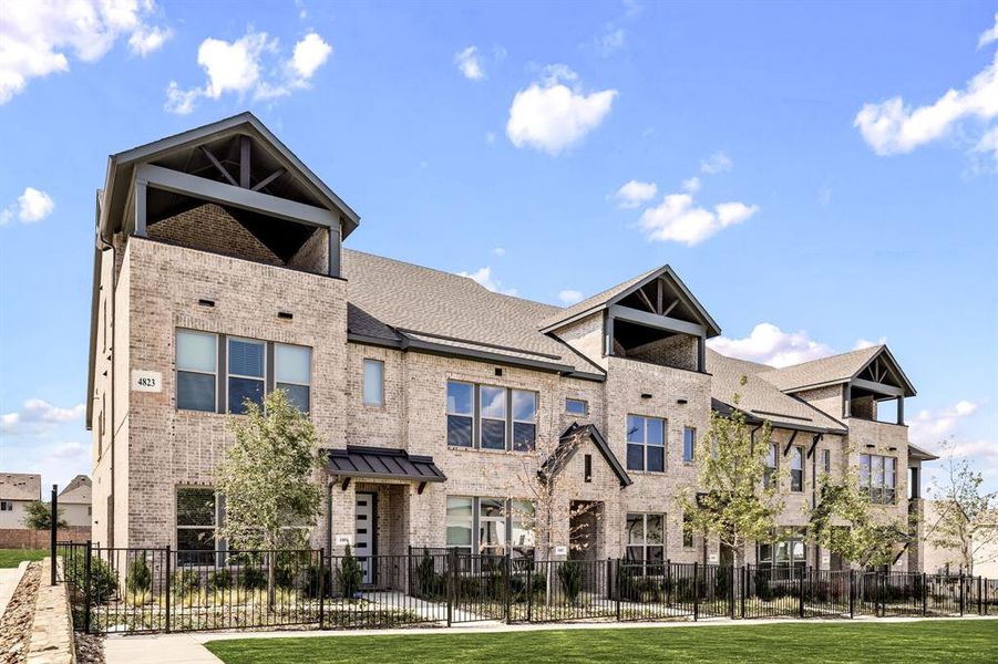 Front exterior of a new home in Hillside at Las Colinas, Irving, TX, highlighting curb appeal (Image 1). Front exterior of a new home in Hillside at Las Colinas, Irving, TX, highlighting curb appeal (Image 1).