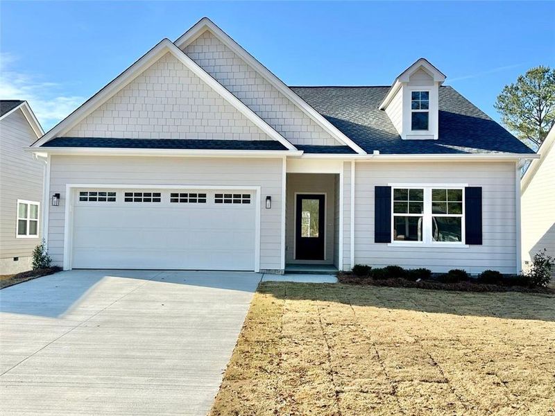 Front exterior of a new home in , Rome, GA, highlighting curb appeal (Image 1). Front exterior of a new home in , Rome, GA, highlighting curb appeal (Image 1).