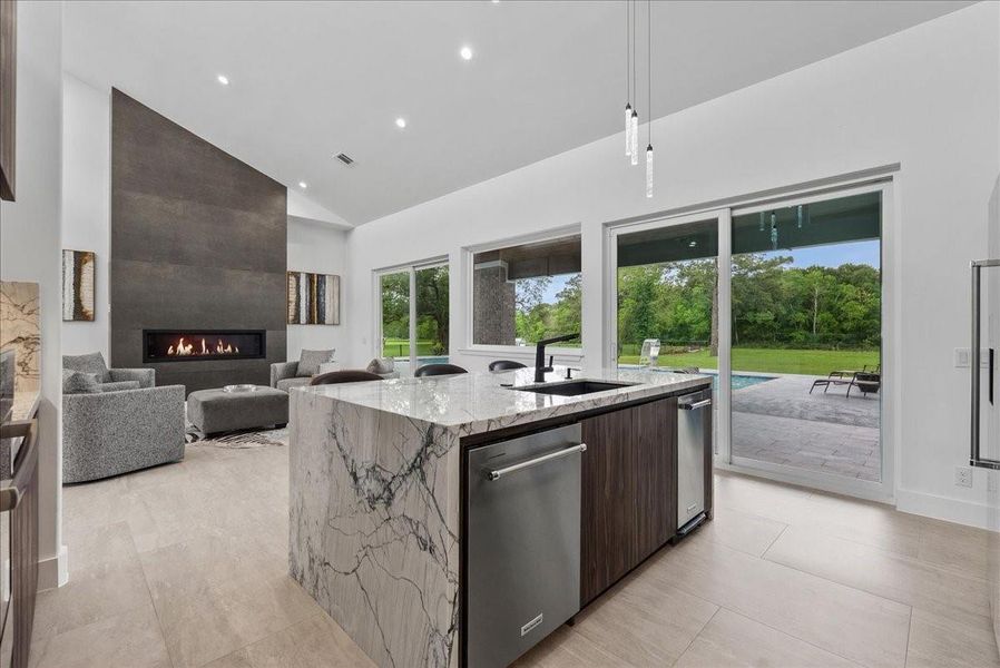 Every detail was made to perfection, to the veining in the beautiful granite waterfall island to the Italian light fixtures and high end appliances.
