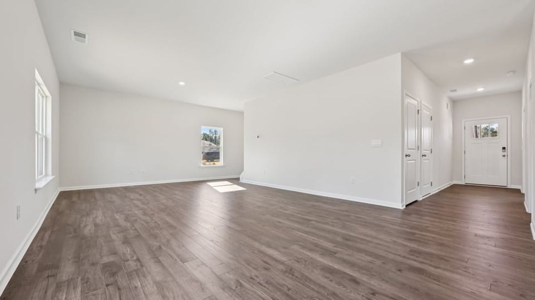 Spacious, unfurnished interior of a new home in Gretchen Pines, West End (Image 13).