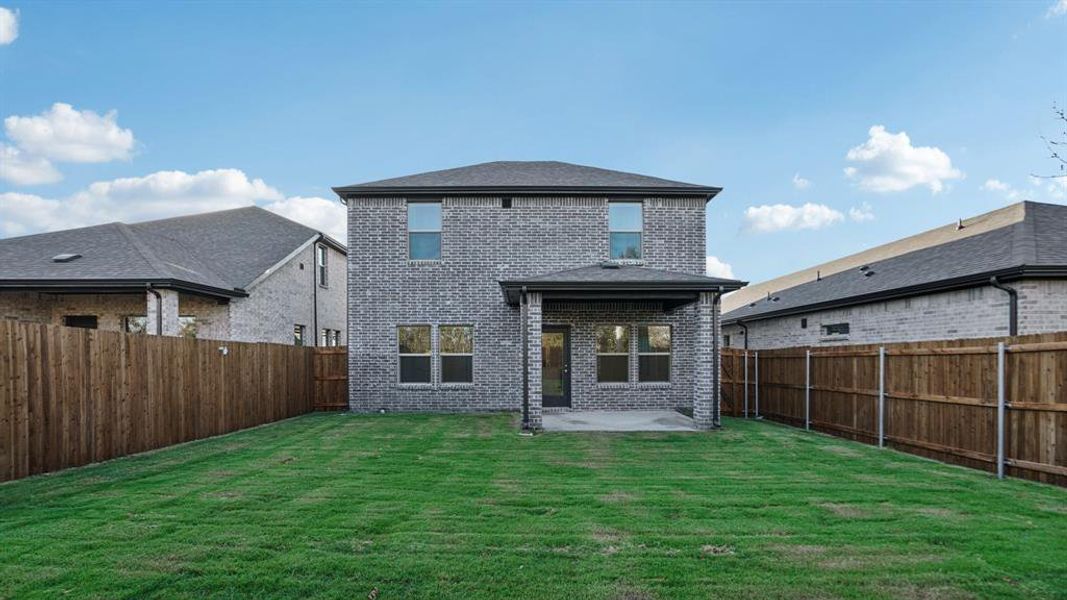Exterior details and patio area of a home in Eastridge - Spring Series, McKinney (Image 4). Exterior details and patio area of a home in Eastridge - Spring Series, McKinney (Image 4).
