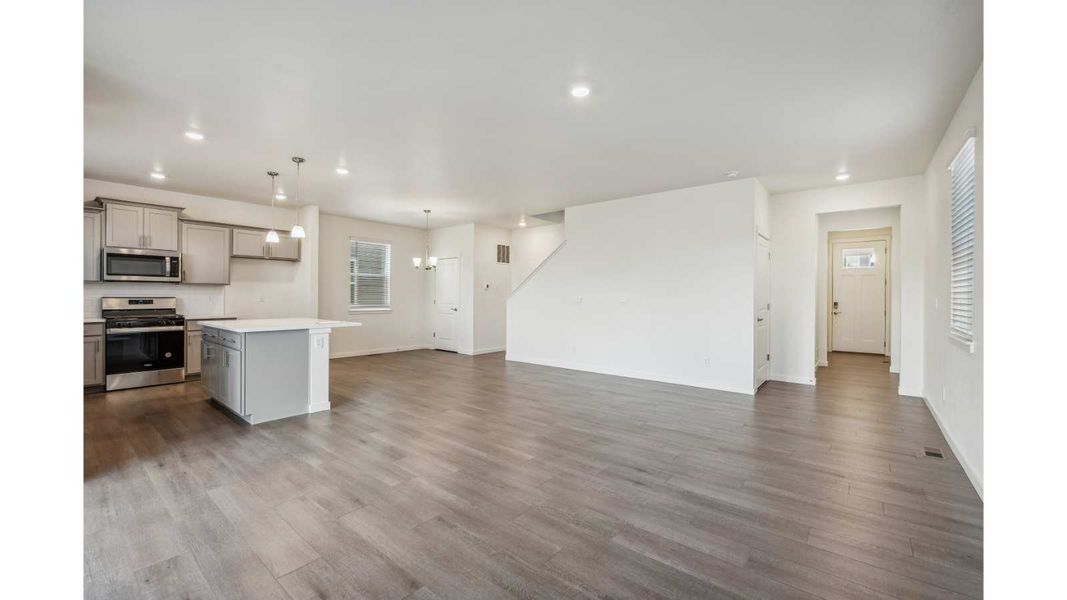Representative unfurnished interior of a home built from the ELDER II by D.R. Horton in The Ridge at Lorson Ranch, Colorado Springs (Image 12).