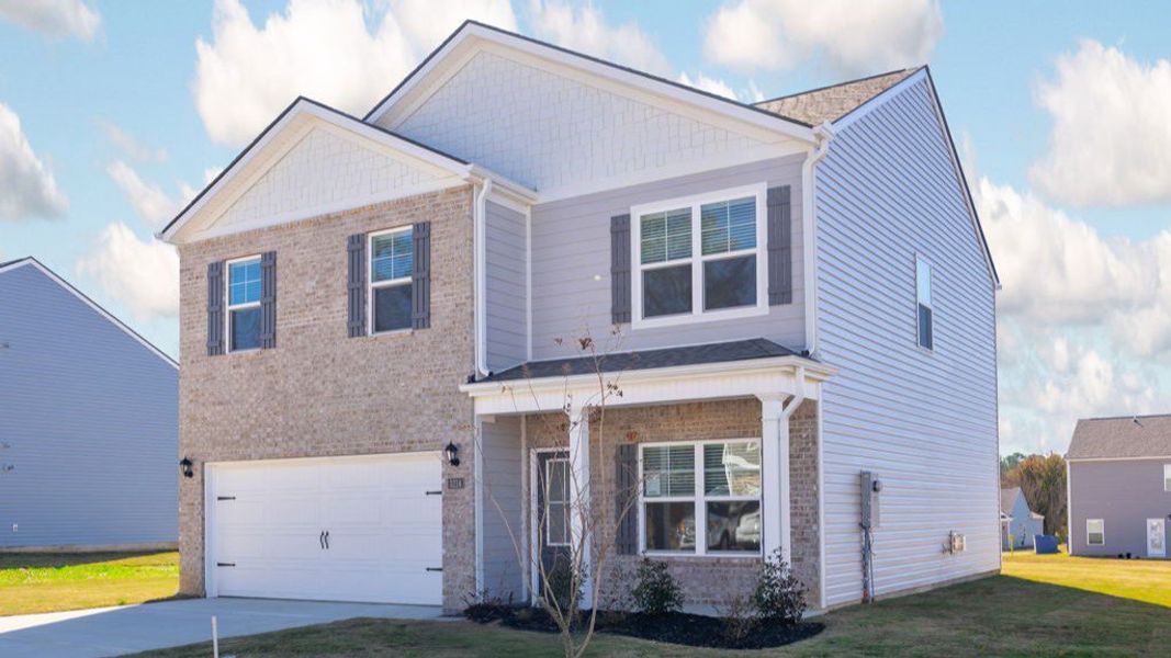 Front exterior of a new home in Hillcrest Landing, Cleveland, TN, highlighting curb appeal (Image 2).