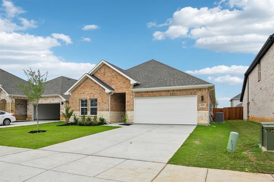 Front exterior of a new home in Summerwood Estates, Red Oak, TX, highlighting curb appeal (Image 20).