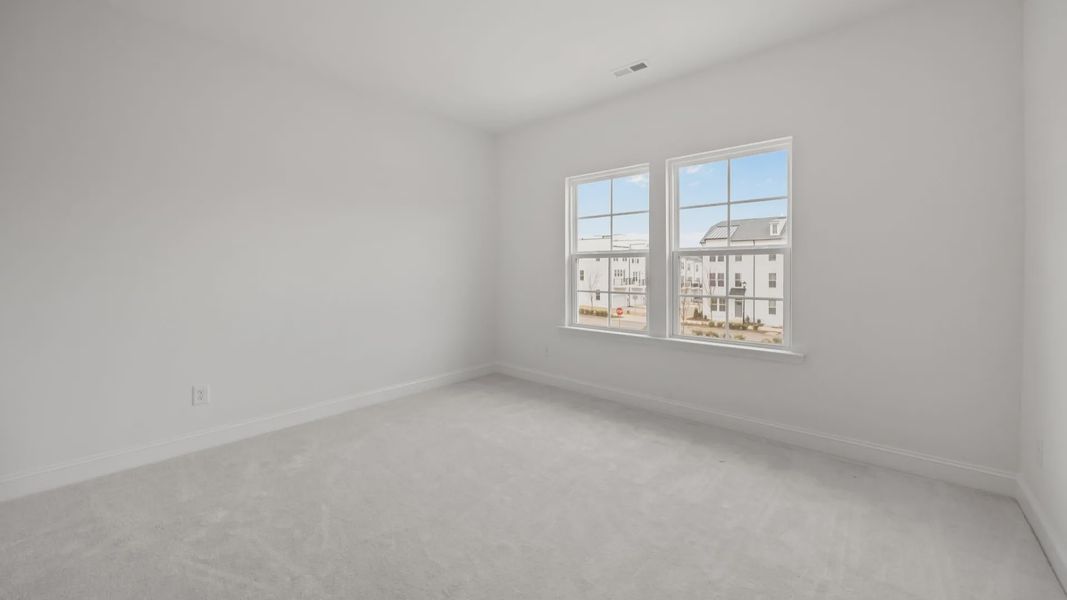 The Brentwood Plan by DRB Homes in River District, Charlotte NC.- Bedroom The Brentwood Plan by DRB Homes in River District, Charlotte NC.- Bedroom