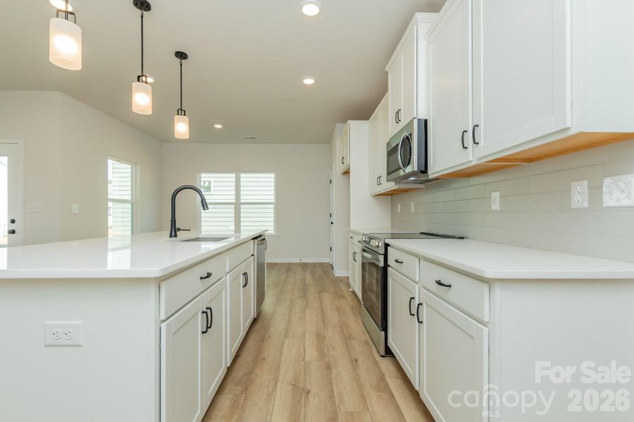 Furnished interior view inside a new home in Sunset Meadows, Charlotte (Image 5).