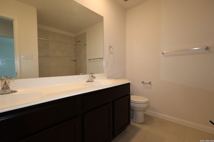 Furnished interior view inside a new home in Verano Farms, Von Ormy (Image 11).