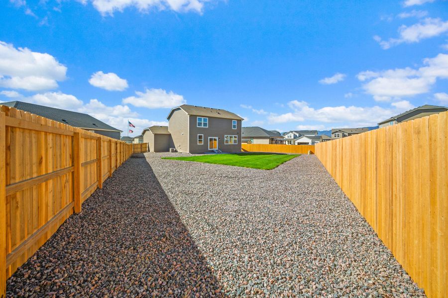 Exterior details and patio area of a home in The Glen-12, Colorado Springs (Image 29).