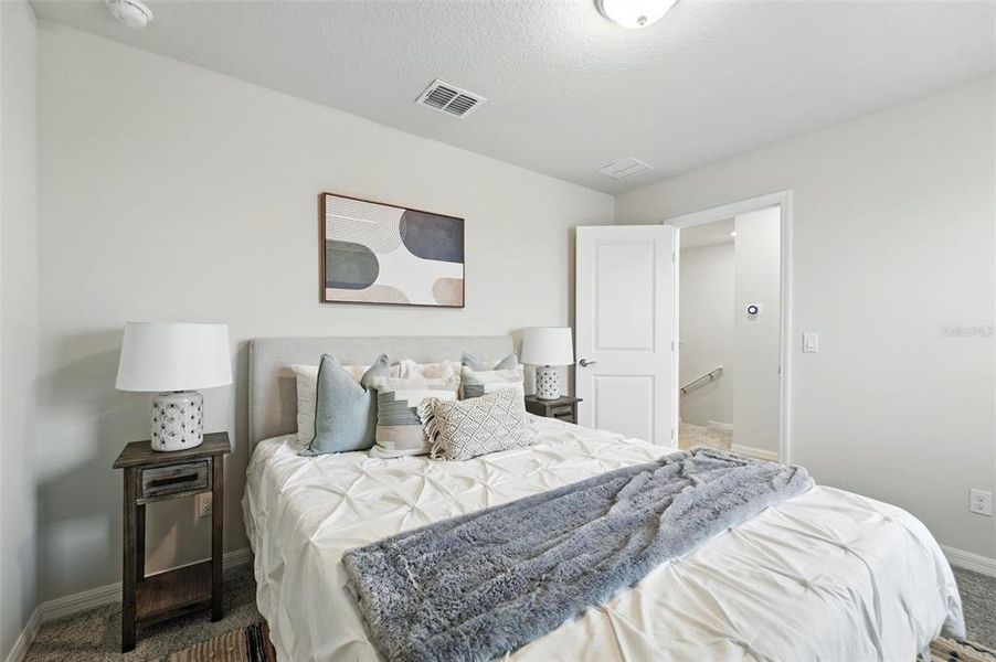 Furnished interior view inside a new home in Amelia Groves, St. Cloud (Image 24).