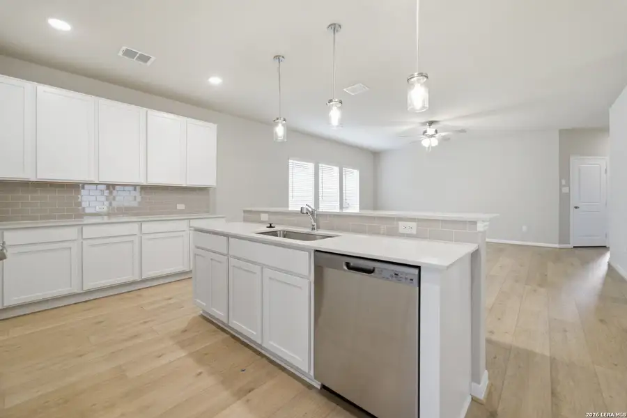 Furnished interior view inside a new home in Hennersby Hollow, San Antonio (Image 7).
