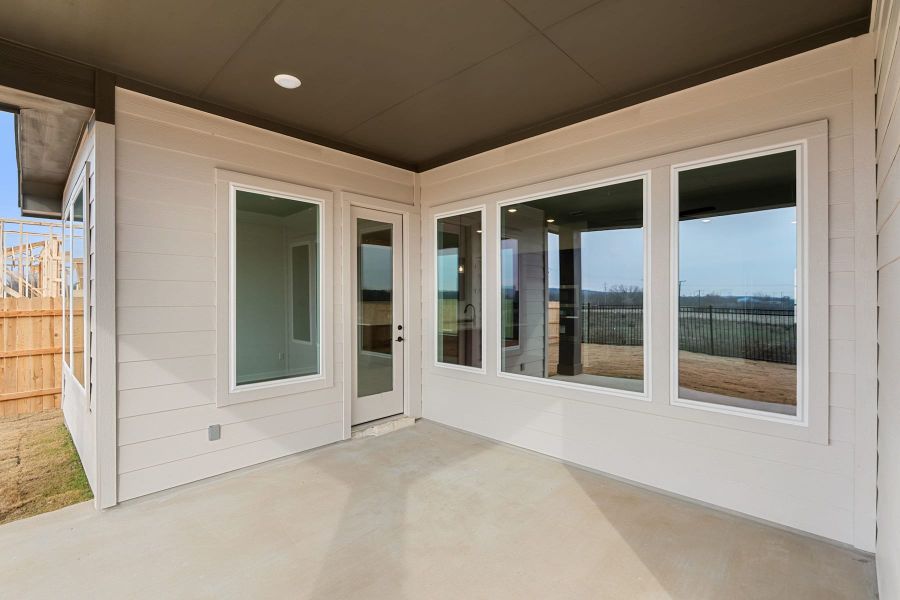 Exterior details and patio area of a home in Lagos Reserve, Manor (Image 25).