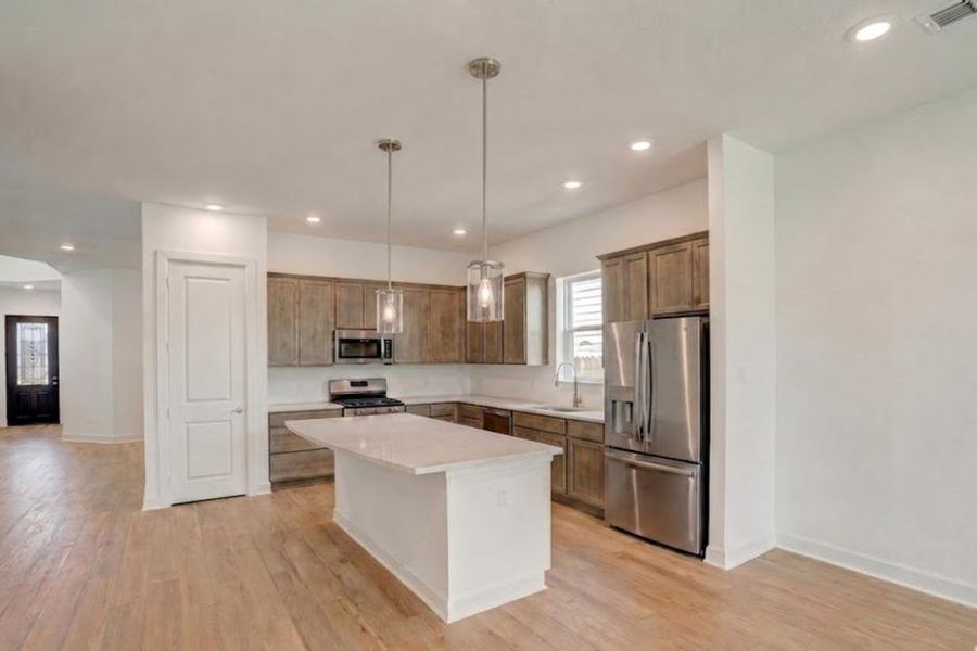 Carnegie Kitchen - The Shoreline (Photo shown is from acompleted home with the same floorplan and similar design selections. Actual design selections may very slightly) Carnegie Kitchen - The Shoreline (Photo shown is from acompleted home with the same floorplan and similar design selections. Actual design selections may very slightly)
