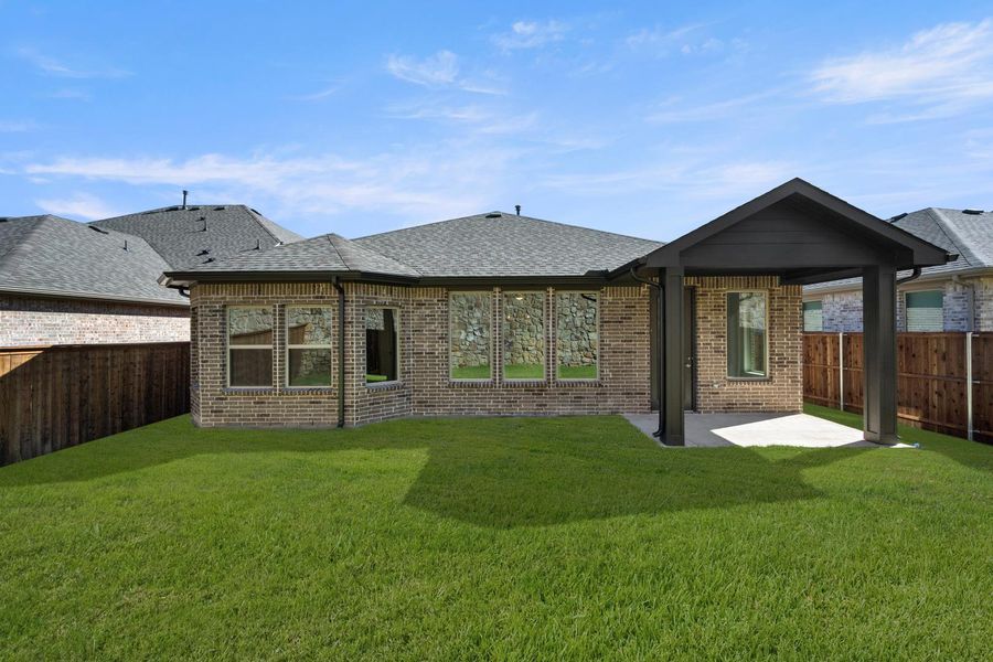 Exterior details and patio area of a home in Discovery Collection at Bridgewater, Midlothian (Image 4).