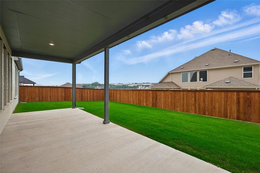 View of yard with a patio area