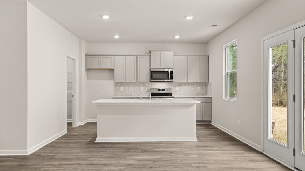 Representative furnished interior of a home built from the Galen by D.R. Horton in The Reserve at Calcutta, Stockbridge (Image 5).