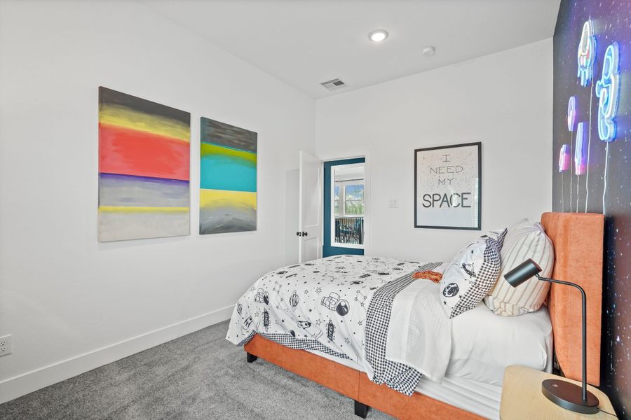 Furnished interior view inside a new home in Bridgeland, Cypress (Image 44).