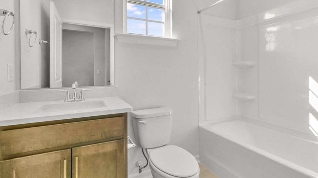 Furnished interior view inside a new home in Quarry Hills - Freedom, Graham (Image 9).