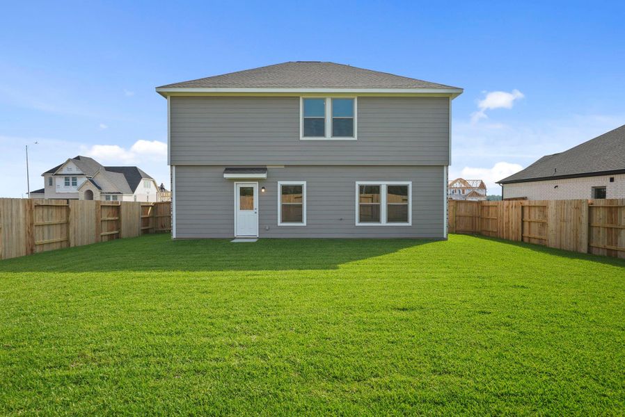 Exterior details and patio area of a home in Arabella on the Prairie, Richmond (Image 19).