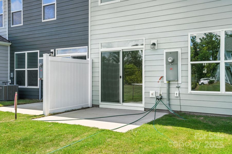 Front exterior of a new home in Harrisburg Village Townhomes, Harrisburg, NC, highlighting curb appeal (Image 16).