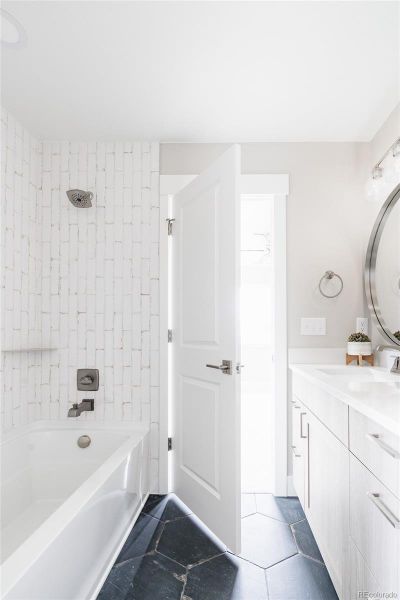 tub to ceiling tile and built in shelves in the second floor bath too