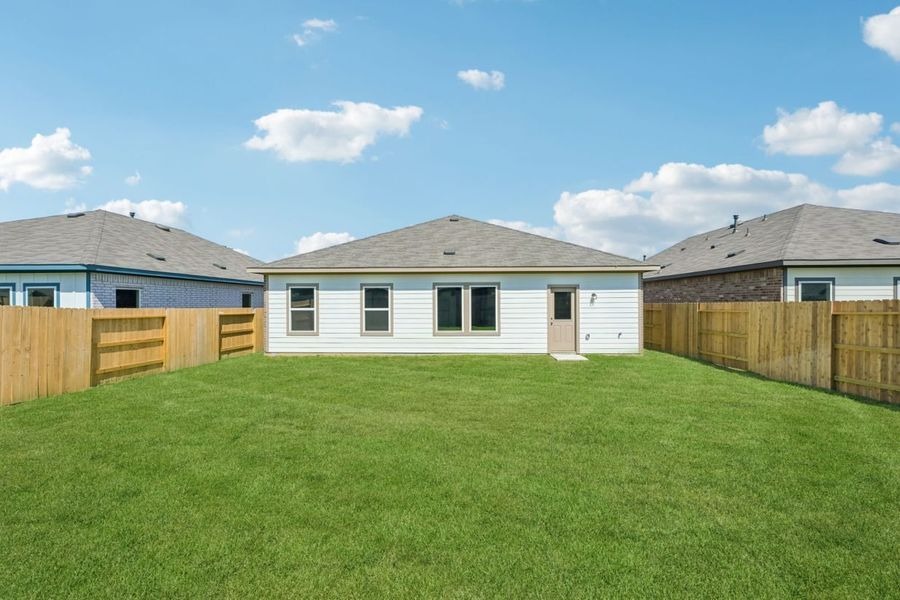 Exterior details and patio area of a home in Harrington Trails, New Caney (Image 3).