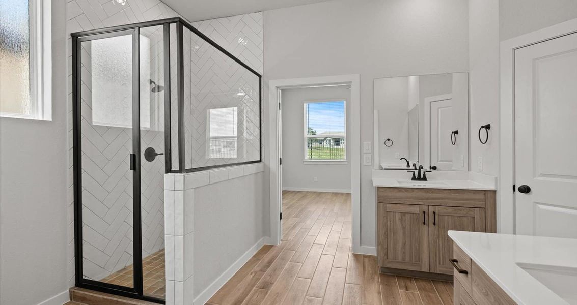 Representative furnished interior of a home built from the Marshall by Chesmar Homes in Village at Three Oaks, Seguin (Image 6).