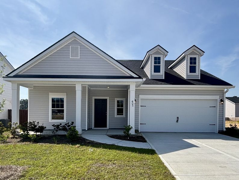 Front exterior of a new home in Belair East, Statesboro, GA, highlighting curb appeal (Image 1). Front exterior of a new home in Belair East, Statesboro, GA, highlighting curb appeal (Image 1).
