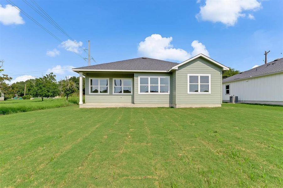 Front exterior of a new home in , Marble Falls, TX, highlighting curb appeal (Image 19).