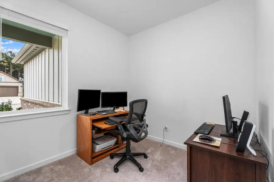Furnished interior view inside a new home in Mason Woods, Cypress (Image 5).