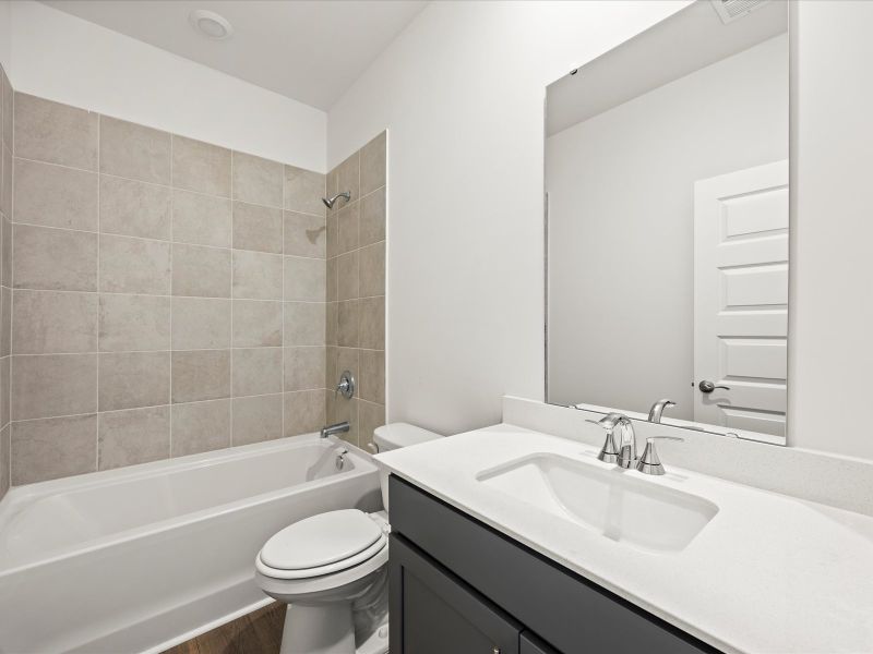 Furnished interior view inside a new home in The Coves at Lakes of Cane Bay II, Summerville (Image 12).