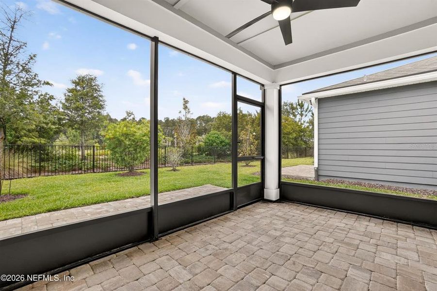 Exterior details and patio area of a home in Del Webb Wildlight, Wildlight (Image 26).