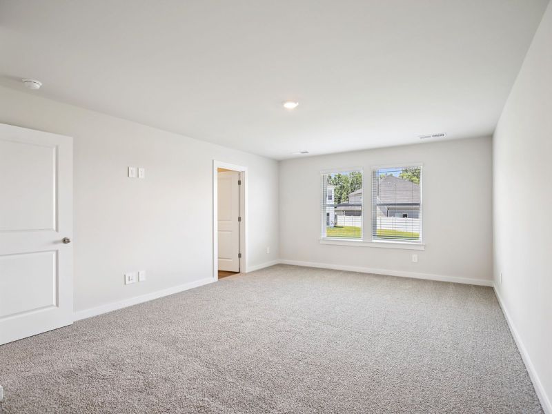 The primary suite offers a private retreat.