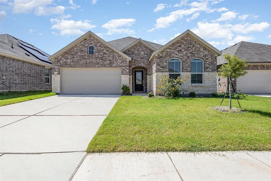 Front exterior of a new home in , Princeton, TX, highlighting curb appeal (Image 21).