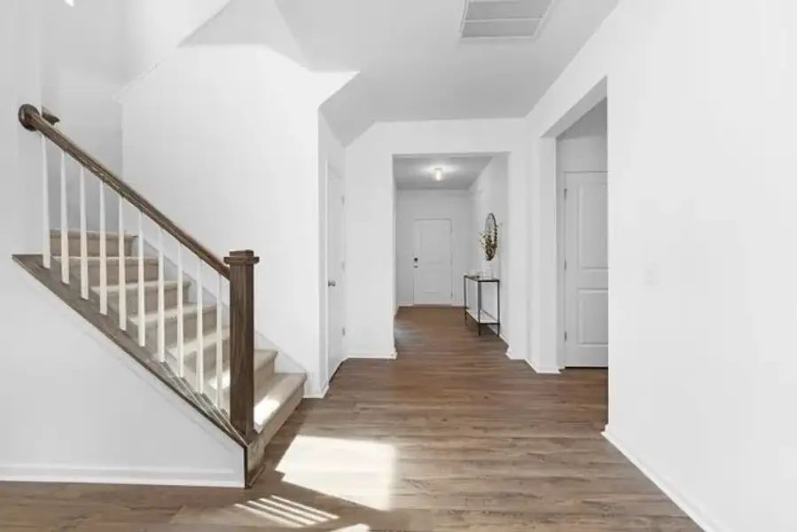 Representative unfurnished interior of a home built from the TA4000 by True Homes in The Retreat at Reedy Fork Ranch, Greensboro (Image 17). Representative unfurnished interior of a home built from the TA4000 by True Homes in The Retreat at Reedy Fork Ranch, Greensboro (Image 17).