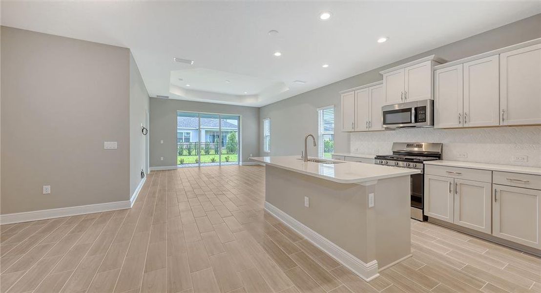 Furnished interior view inside a new home in Wildleaf, Parrish (Image 4).