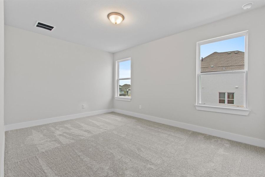 Unfurnished room featuring carpet