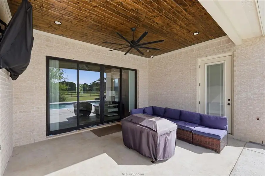 Exterior details and patio area of a home in , Bryan (Image 28).
