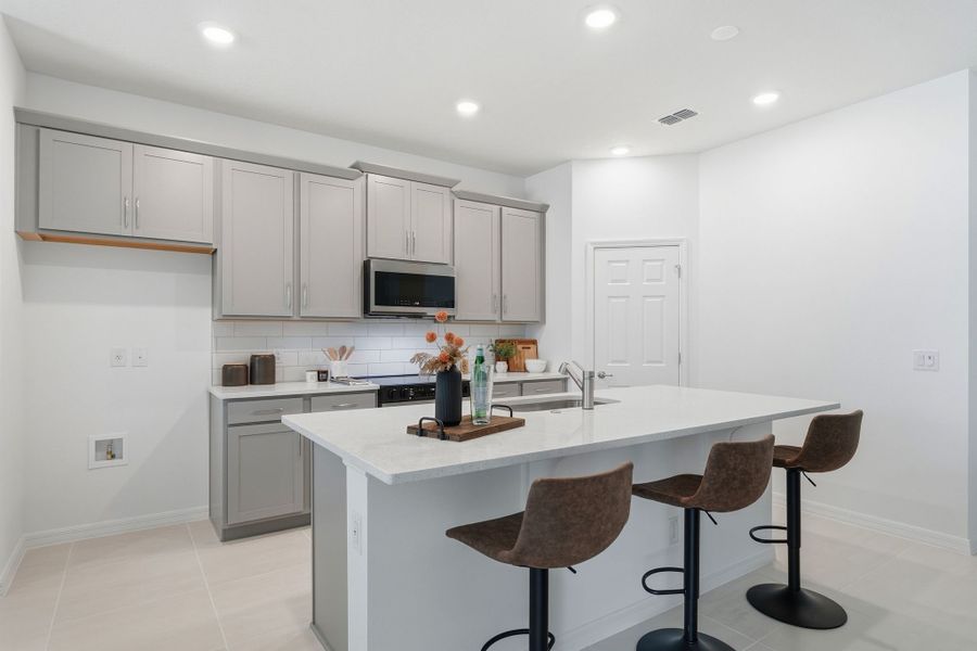 Furnished interior view inside a new home in Trinity Gardens, Deland (Image 8).