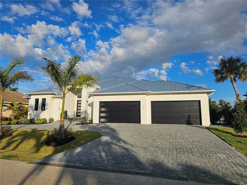 Front exterior of a new home in , Punta Gorda, FL, highlighting curb appeal (Image 29). Front exterior of a new home in , Punta Gorda, FL, highlighting curb appeal (Image 29).