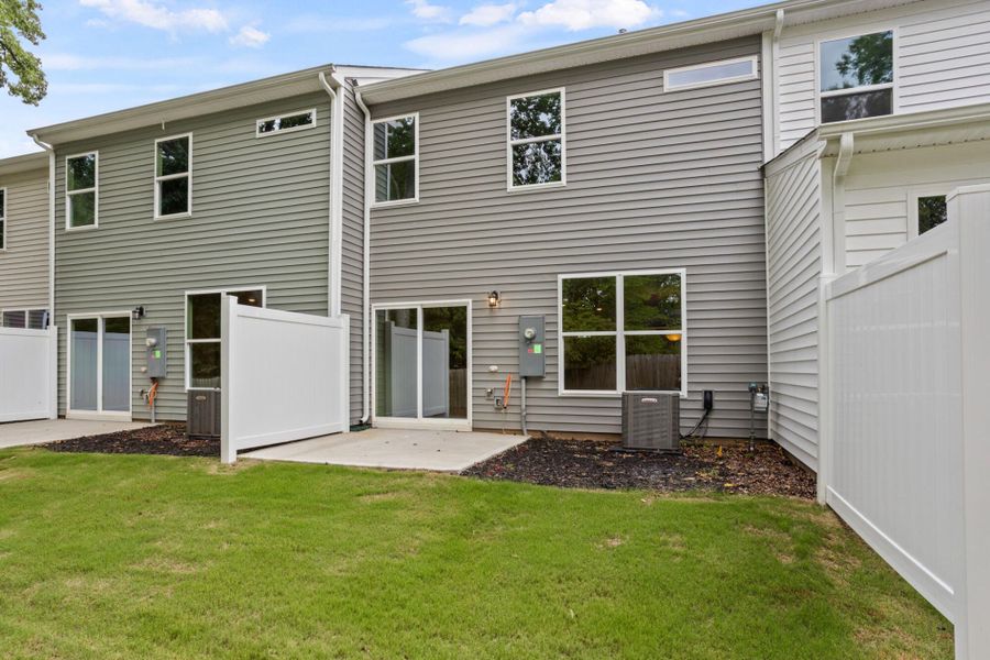 Exterior details and patio area of a home in East Main Townes, Spartanburg (Image 19). Exterior details and patio area of a home in East Main Townes, Spartanburg (Image 19).