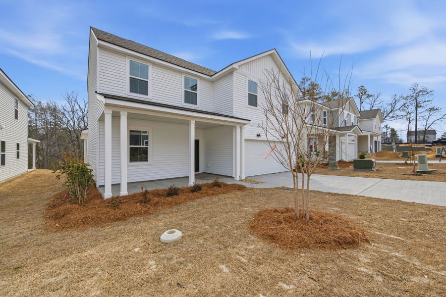 Exterior details and patio area of a home in Grand Arbor, Blythewood (Image 4).