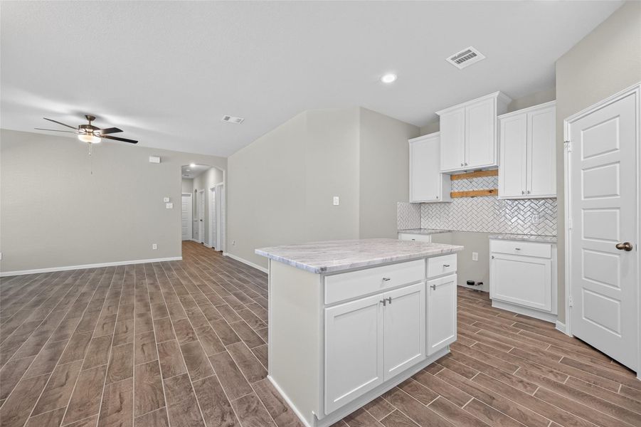 Furnished interior view inside a new home in Woodland Lakes, Huffman (Image 8).