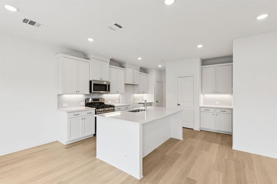 Featuring ample storage and prep space, this this dream kitchen is everything you have been searching for! Featuring ample storage and prep space, this this dream kitchen is everything you have been searching for!