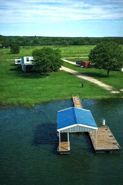 Waterfront at Lake Leon! (grass digitally recolored) #lakefrontliving #lakeleon #waterfront #airbnb #incomeproperty