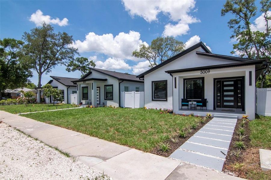 Front exterior of a new home in , Gulfport, FL, highlighting curb appeal (Image 1). Front exterior of a new home in , Gulfport, FL, highlighting curb appeal (Image 1).