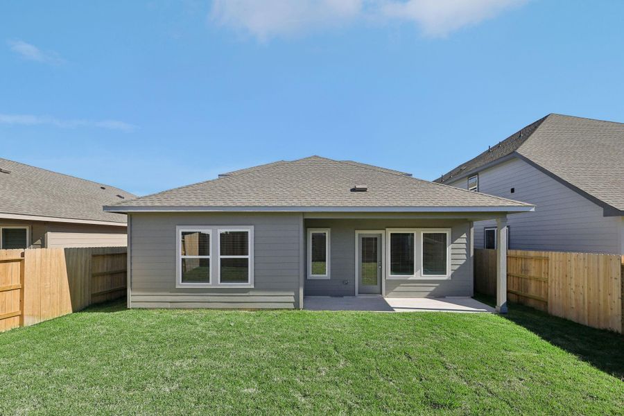 Exterior details and patio area of a home in Landing Meadows - Premier Series, New Caney (Image 3).