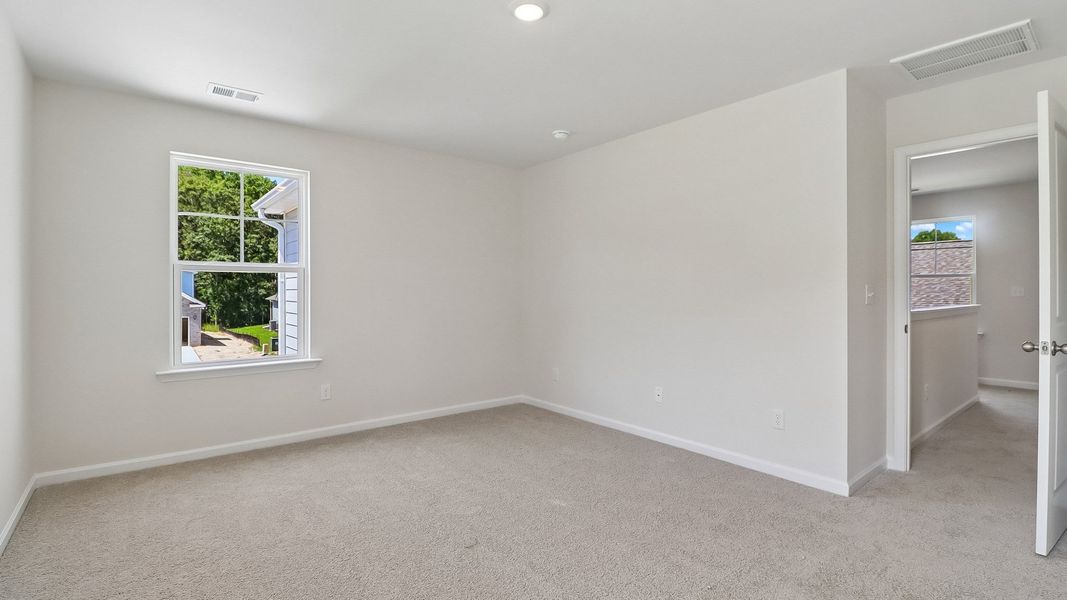 Spacious, unfurnished interior of a new home in Sease's Pond, Gilbert (Image 17).